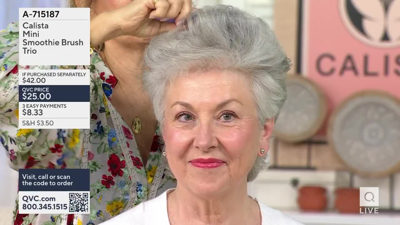 A woman's hand brushes through another woman's voluminous, silver hair. The woman in front smiles directly at me, her makeup bright and polished.