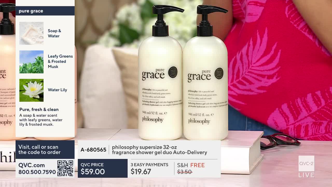 Two large bottles of "Pure Grace" shower gel stand side-by-side on a table. A QVC2 graphic displays product details and pricing below the bottles.