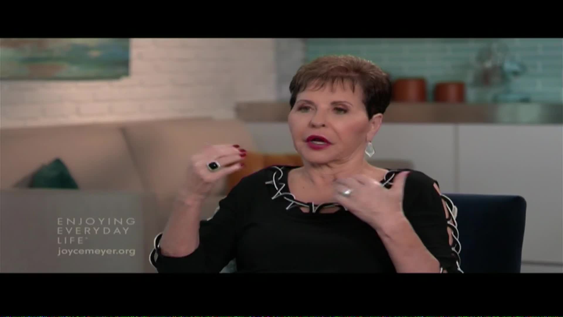 The woman speaks with her hands, gesturing emphatically. Her words are broadcast on The Word Network, a familiar sight in homes across the United States.