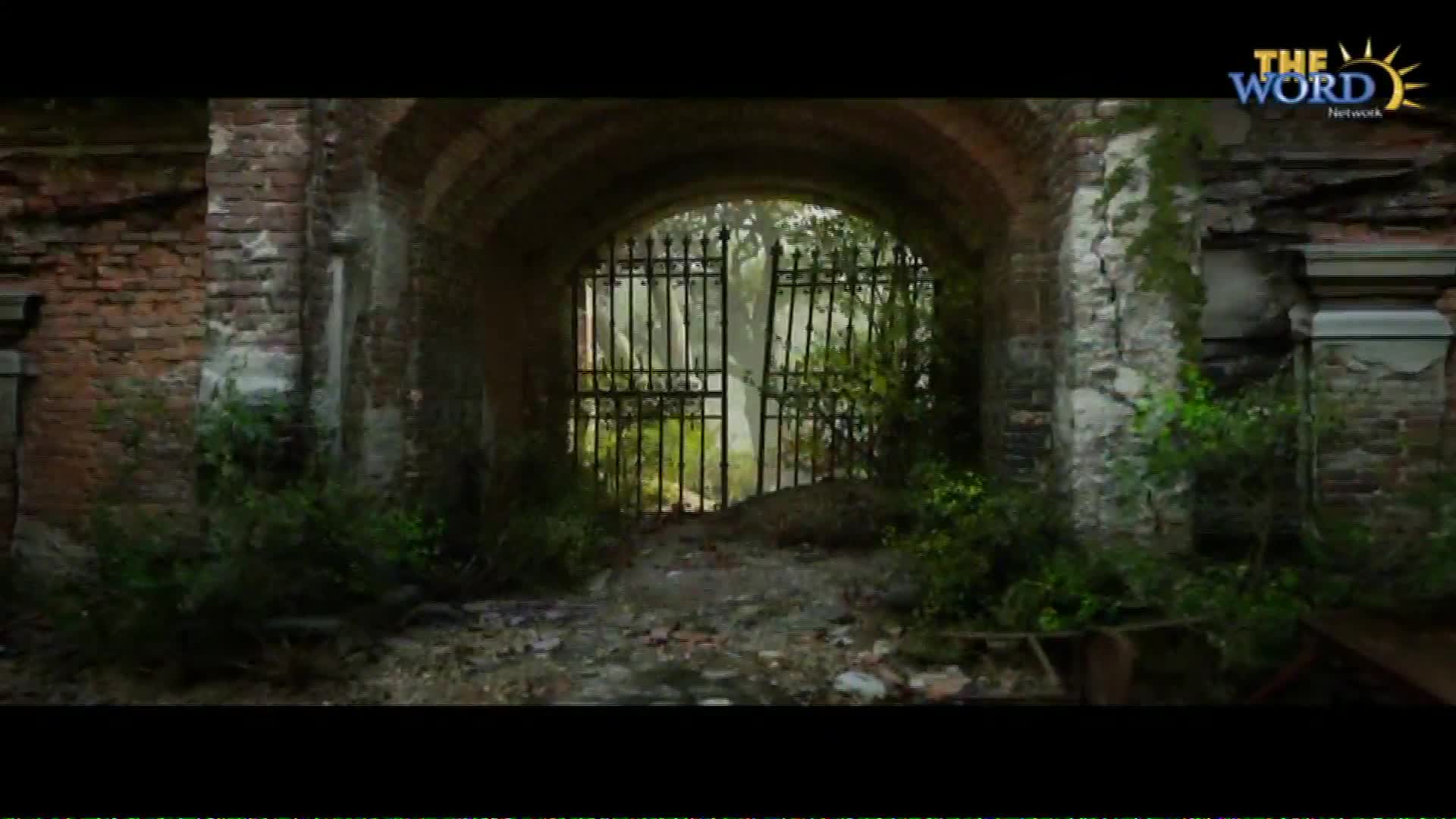 The ornate iron gates stand open, revealing a path into overgrown grounds.  Vines climb the weathered brick archway, hinting at a forgotten place in America.
