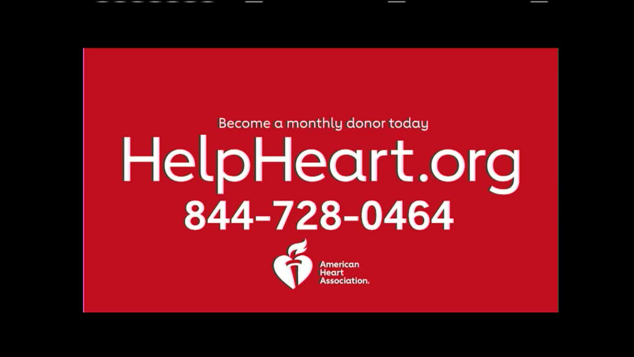 A bright red sign with white text flashes on screen, displaying "HelpHeart.org" and a phone number. The American Heart Association logo sits at the bottom.