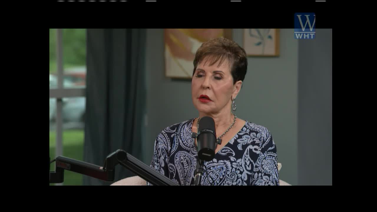 A woman with short brown hair and a patterned blue and white top speaks into a microphone. The World Harvest Television logo appears in the upper right corner.