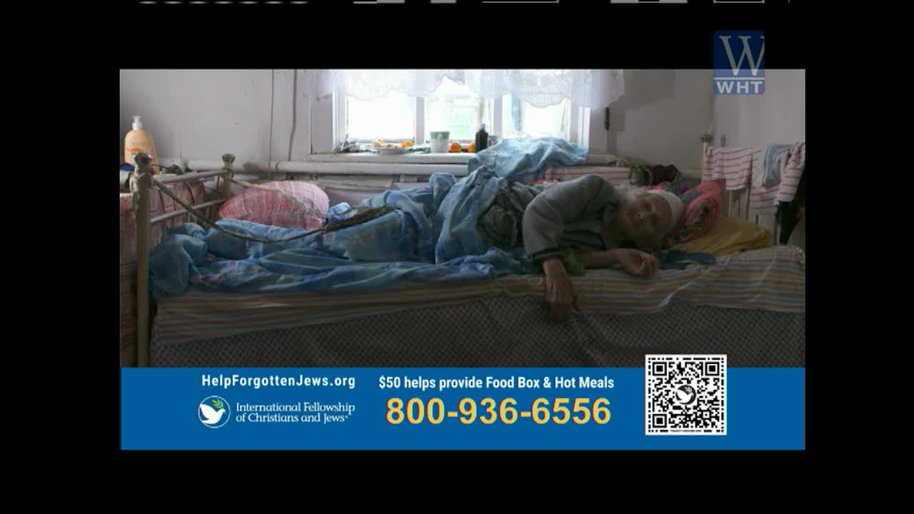 An elderly person lies in a rumpled bed, covered by a blue blanket. A World Harvest Television logo appears in the upper right corner.