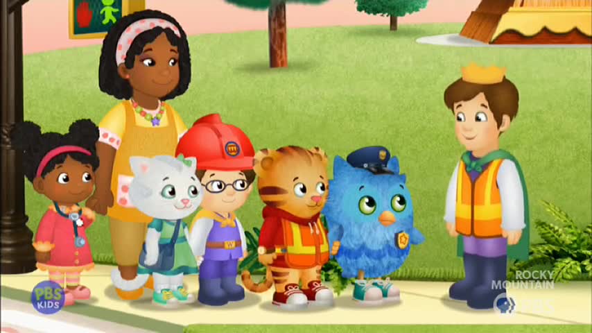 A group of cartoon characters, including a tiger and an owl, stand in a line, facing a man in a vest. The scene, which could be from an episode of "Daniel Tiger's Neighborhood" on 10 Bold, is set outdoors.
