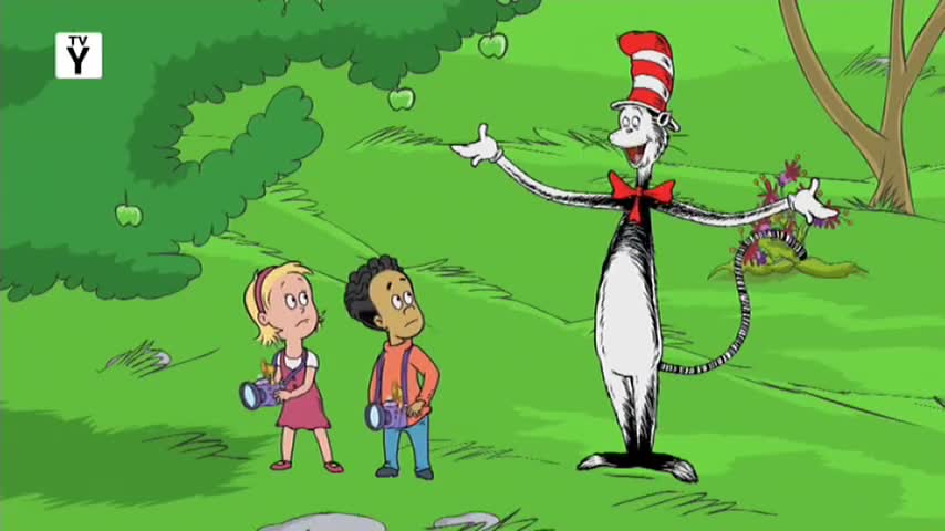 The Cat in the Hat, with his red and white striped hat, gestures widely to the two children, who look unsure. The scene, likely from a show on 10 Bold in Australia, is set under a green tree with green apples.
