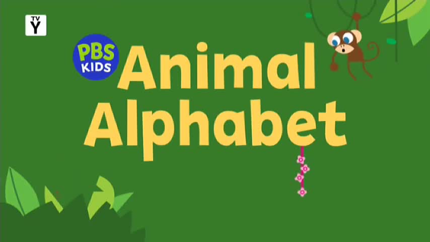 The title card for "Animal Alphabet" is on display, the yellow letters standing out against a green background. A cartoon monkey hangs from a vine, looking surprised.

