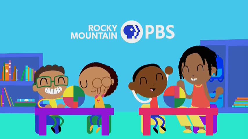 Four children sit at desks, each holding a colorful segmented ball. They're all smiling, seemingly enjoying a lesson on Rocky Mountain PBS.
