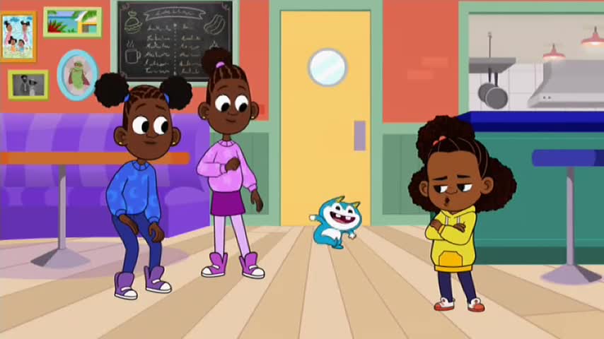 Three girls stand in a brightly-colored diner, while a small blue creature bounces on the floor. One girl, arms crossed, looks unimpressed, while the other two seem to be watching the action on 10 Bold.
