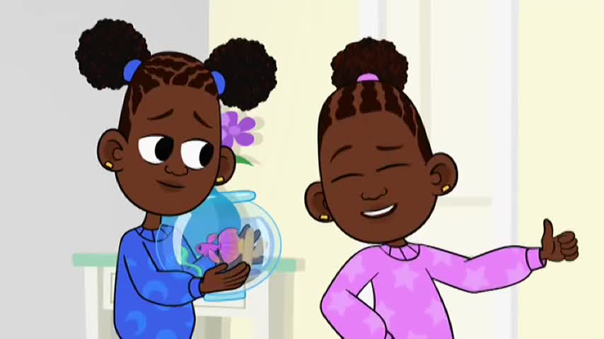 A girl in a blue pyjama top holds a fishbowl with a small, pink fish. Her sister, in a pink pyjama top, gives a thumbs up with a wide smile.