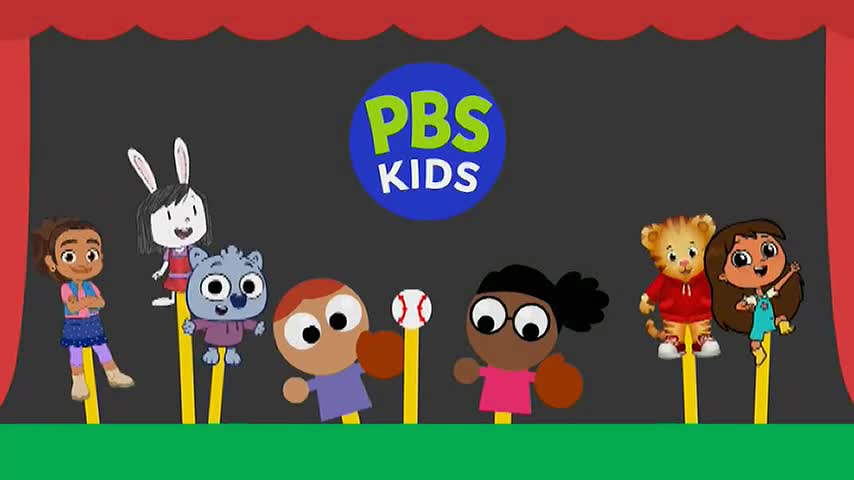 A group of puppets, some human and some animal, are lined up on yellow sticks. A baseball sits atop one of the sticks, ready for play. A group of puppets, some human and some animal, are lined up on yellow sticks. A baseball sits atop one of the sticks, ready for play.