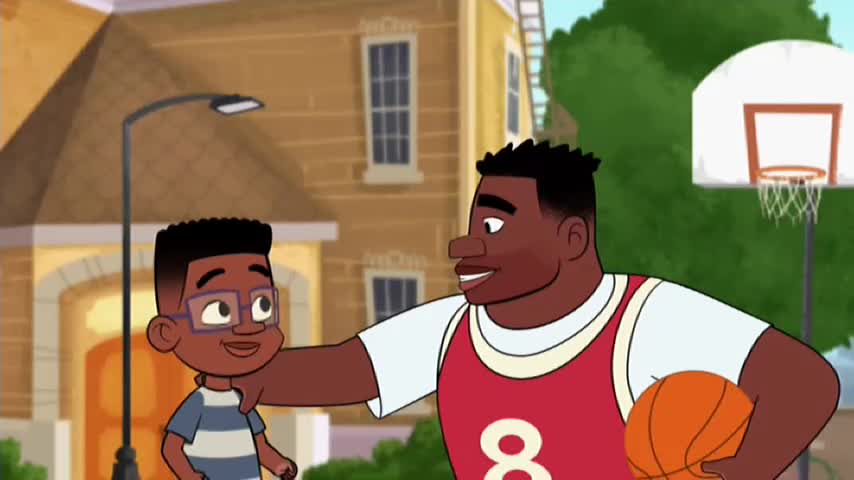 A man in a red basketball jersey with the number 8 on it, holding an orange ball, smiles down at a young boy wearing glasses. They stand on a paved area in front of a house, a basketball hoop visible behind them. A man in a red basketball jersey with the number 8 on it, holding an orange ball, smiles down at a young boy wearing glasses. They stand on a paved area in front of a house, a basketball hoop visible behind them.