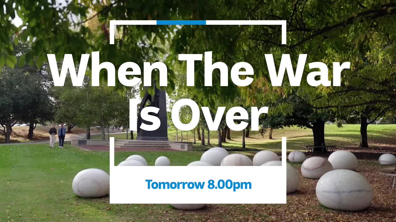Two figures stroll along a grassy path toward a war memorial. The scene, framed by trees and large, smooth stones, is likely a promotion for an ABC Australia program.
Two figures stroll along a grassy path toward a war memorial. The scene, framed by trees and large, smooth stones, is likely a promotion for an ABC Australia program.