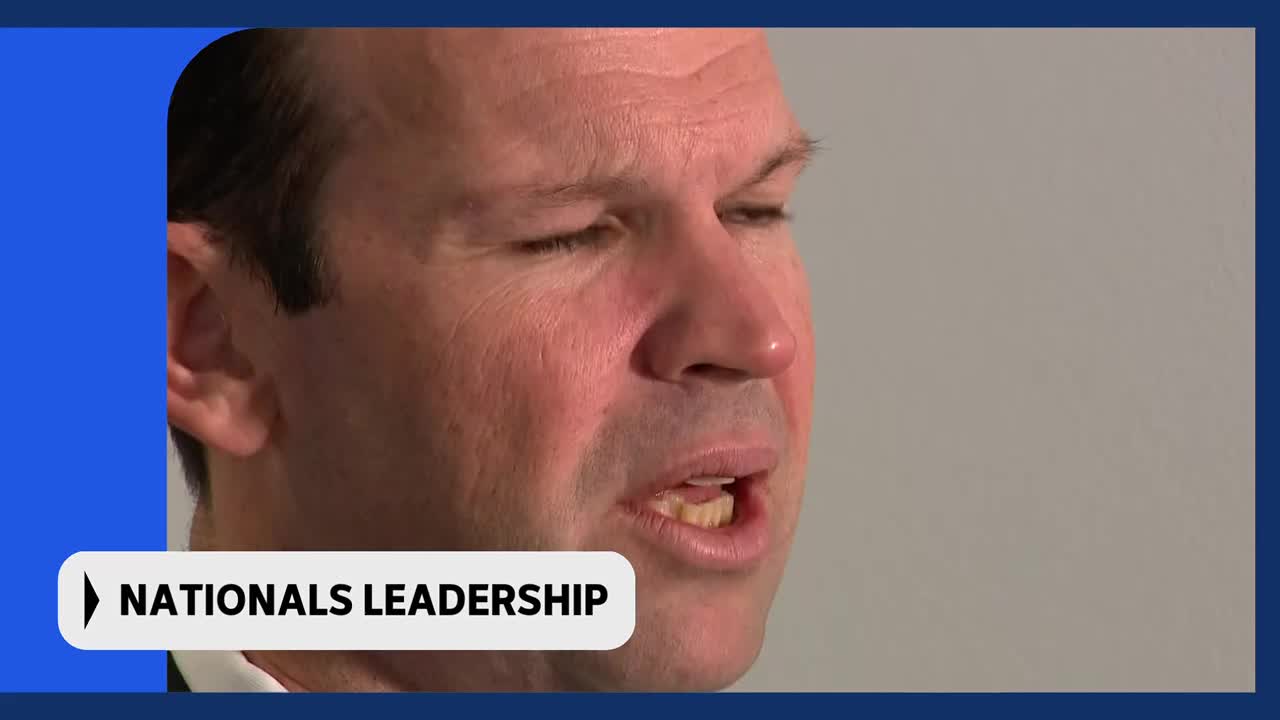 A man's face fills the frame, his mouth open as he speaks. The words "NATIONALS LEADERSHIP" appear in white text on a grey banner across the bottom left.