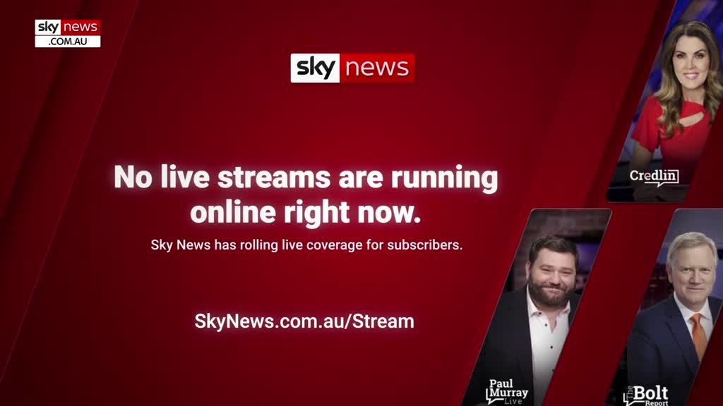 A Sky News Extra 1 screen from Australia displays a red background with white text stating that no live streams are running. The bottom corner shows a website address, and portraits of commentators are visible on the right.
A Sky News Extra 1 screen from Australia displays a red background with white text stating that no live streams are running. The bottom corner shows a website address, and portraits of commentators are visible on the right.
