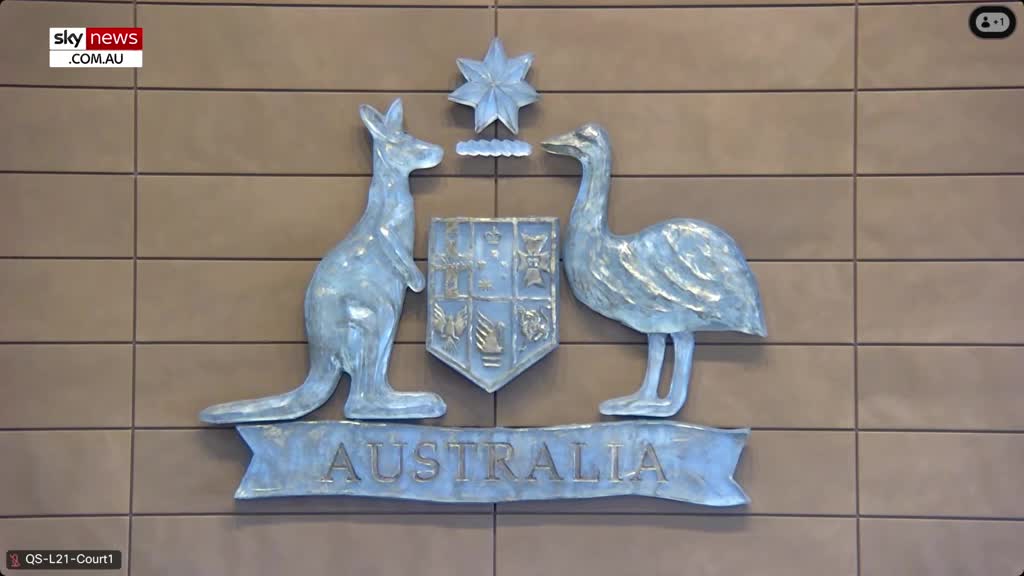 The Australian coat of arms, featuring a kangaroo and an emu, stands prominently against a tiled wall. A Sky News Extra watermark appears in the corner.