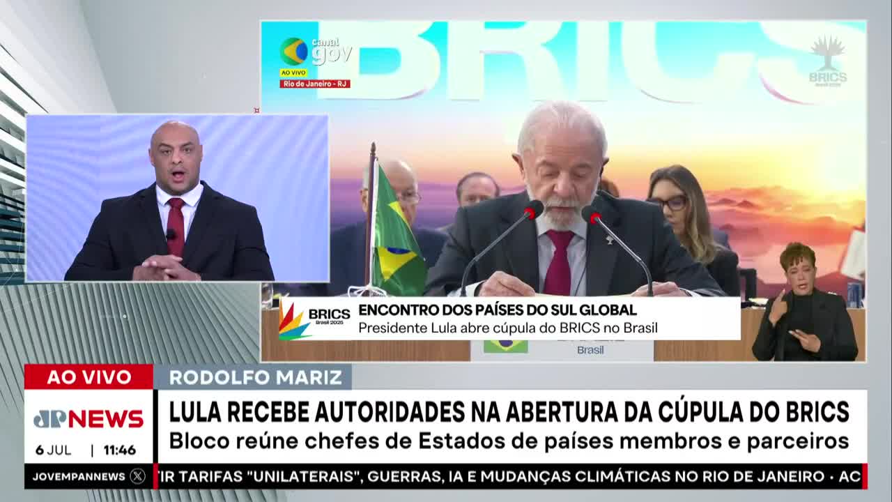 In the Jovem Pan News studio, President Lula is at a podium, speaking into microphones. A simultaneous interpreter is signing on the right, while a commentator on the left reacts to the news.
