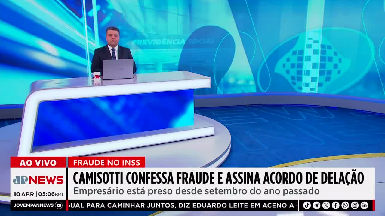 A man in a suit sits at a news desk, a laptop open before him. The Jovem Pan News logo is visible on the screen, and a headline announces a confession of fraud.