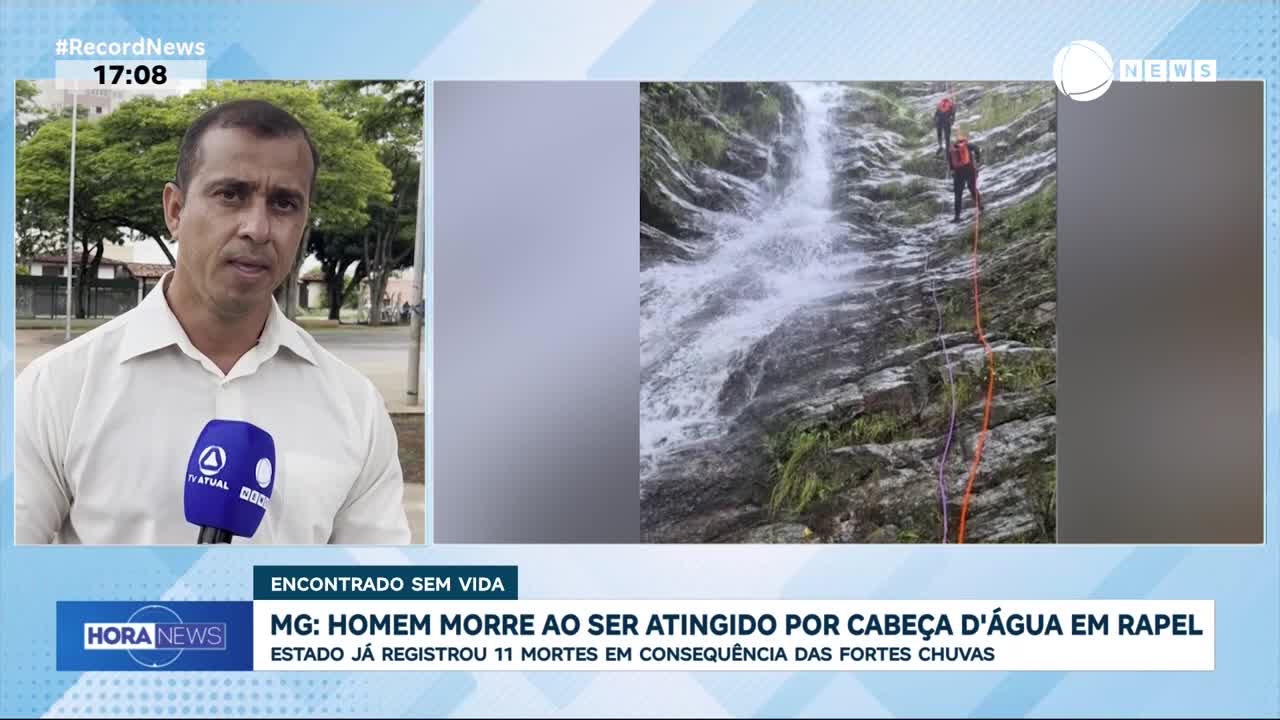 Two people are rappelling down a steep, rocky waterfall. The water cascades down, and ropes hang alongside the climbers.