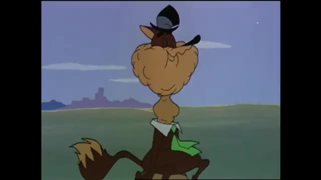 A cartoon character, wearing a hat, is running across a green field. The character's body is elongated, and its tail is trailing behind it.
