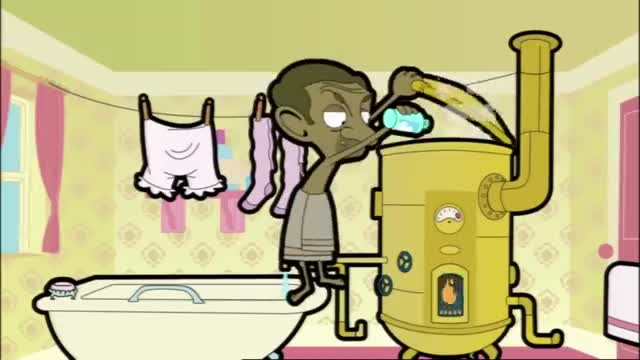 A man in a towel is pouring water into a large, yellow water heater. Steam billows out of the top, while clean laundry hangs on a clothesline above a bathtub.
