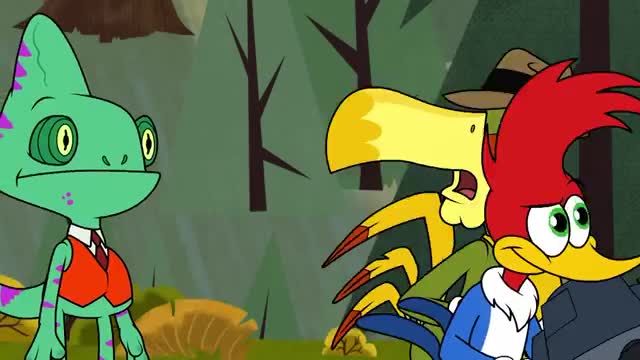 The green chameleon in a suit looks directly at the camera, while a yellow bird and Woody Woodpecker seem to be surprised by something off-screen. The background shows a simple forest scene.
The green chameleon in a suit looks directly at the camera, while a yellow bird and Woody Woodpecker seem to be surprised by something off-screen. The background shows a simple forest scene.
