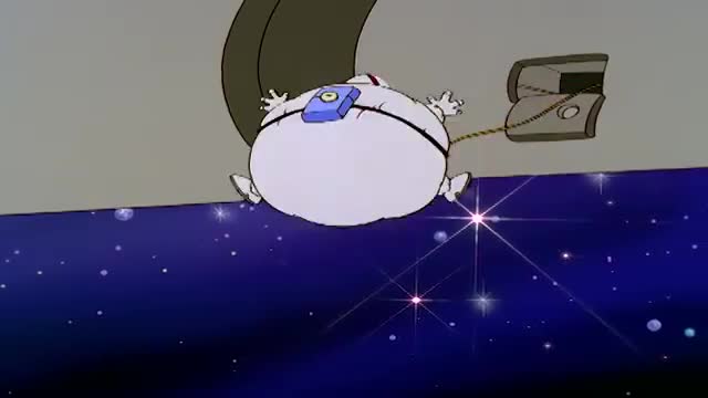 An inflated, white figure floats in the air, tethered to a small box on the wall. The character is suspended above a deep blue expanse dotted with sparkling stars.
An inflated, white figure floats in the air, tethered to a small box on the wall. The character is suspended above a deep blue expanse dotted with sparkling stars.