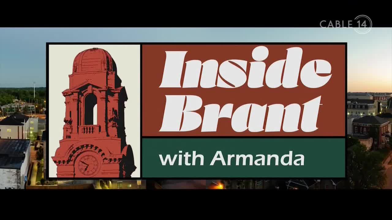 The Cable 14 logo sits in the top right corner, while the "Inside Brant" title card dominates the screen. A stylized illustration of a clock tower and a cityscape backdrop frame the show's title.
