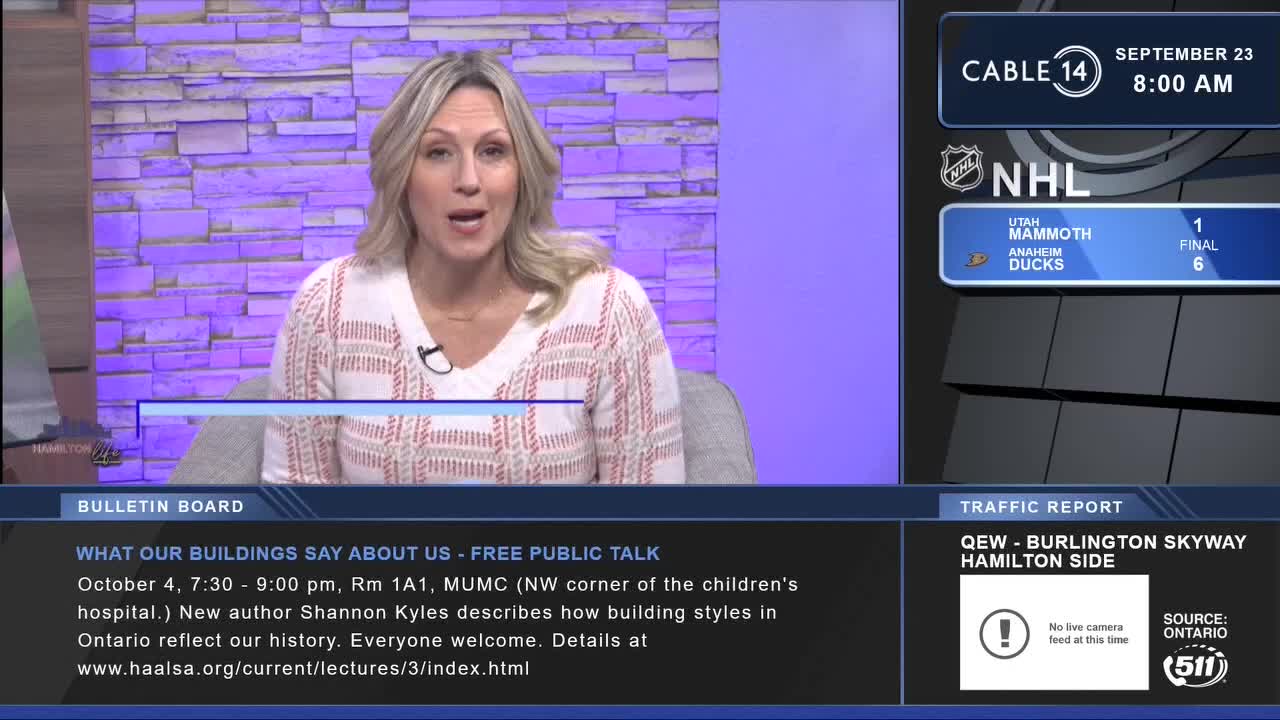 A woman with blonde hair is speaking, framed by a Cable 14 Hamilton backdrop. Graphics about a hockey game and a traffic report are displayed on the screen.
