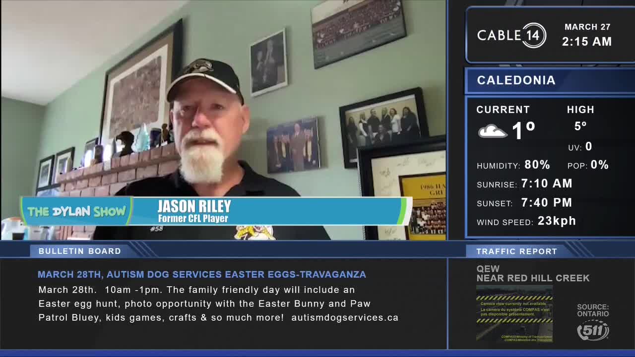 A man with a white beard and a black baseball cap speaks directly to the camera. A graphic overlay identifies him as Jason Riley, former CFL player, on "The Dylan Show."