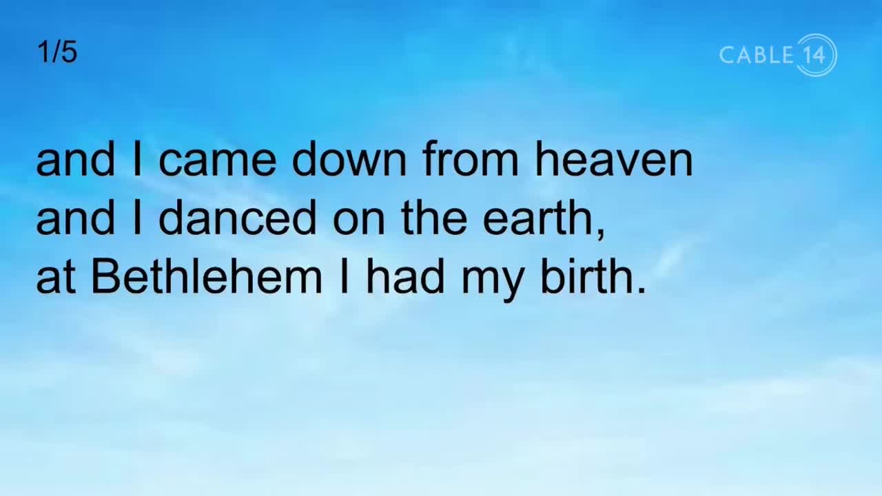 Text scrolls across a bright blue sky, the words "and I came down from heaven and I danced on the earth, at Bethlehem I had my birth." A small "1/5" appears in the top left corner, and the Cable 14 Hamilton logo is visible in the upper right.