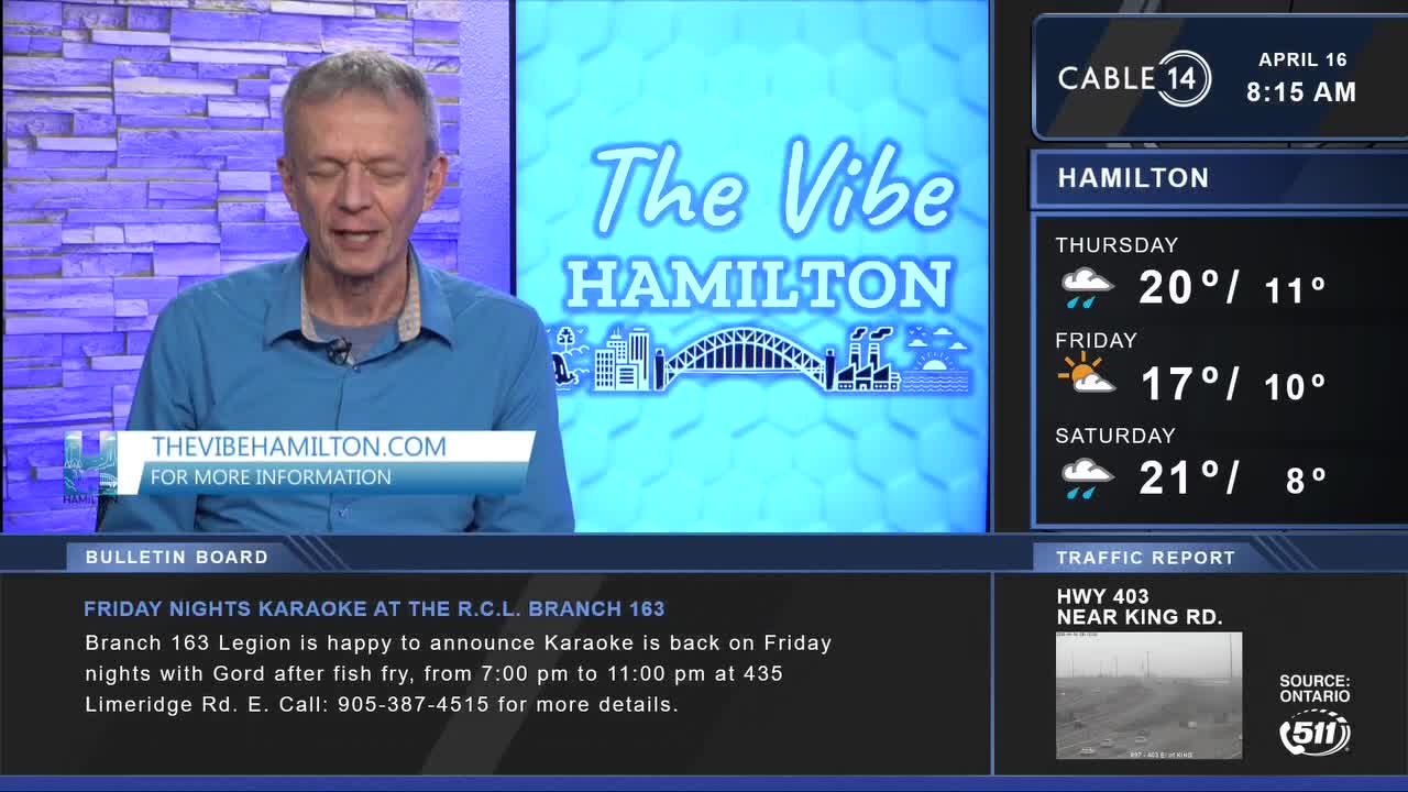 A man in a blue shirt speaks into a microphone, with "The Vibe Hamilton" displayed behind him. A weather report for Hamilton shows rain and temperatures in the low 20s and 10s.