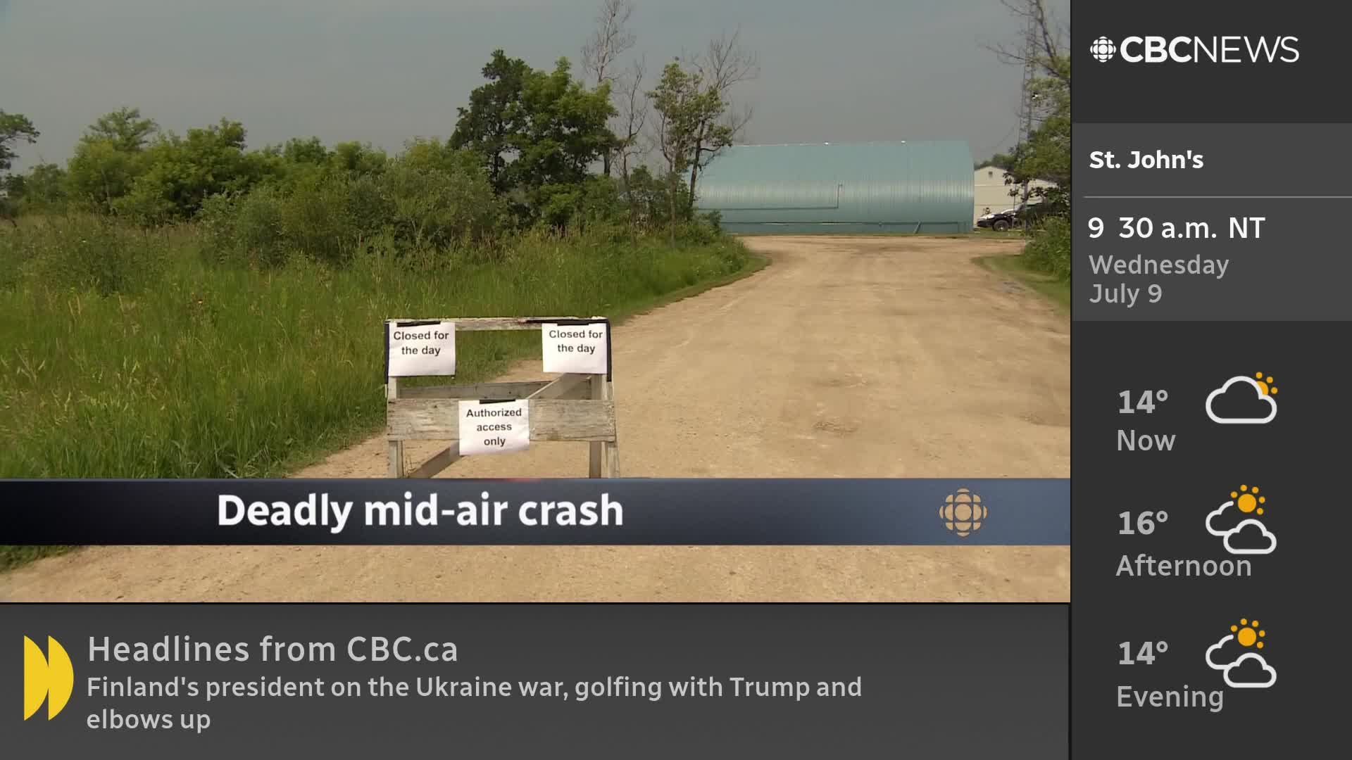 A dirt road leads to a large, blue-roofed building, with a barrier marked "Closed for the day" blocking the way.  CBC News Network's coverage of a "deadly mid-air crash" is underway.
