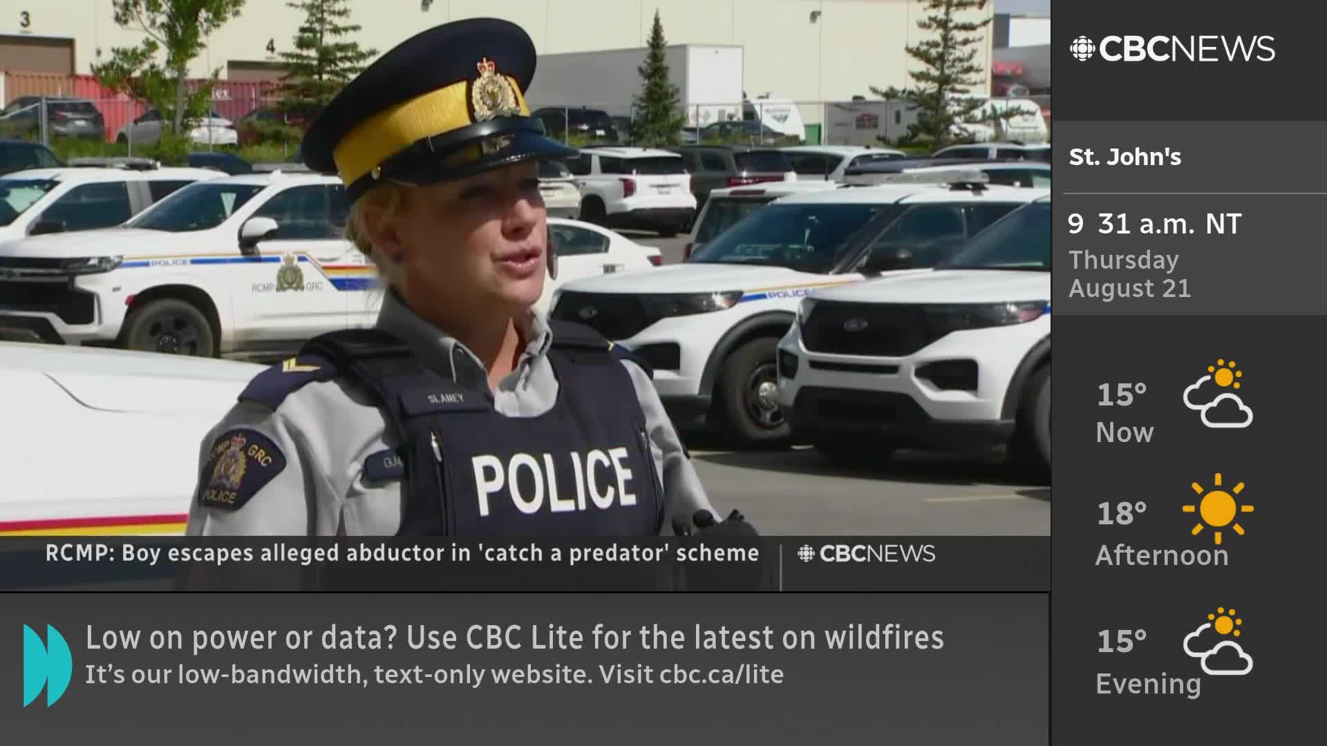 A Royal Canadian Mounted Police officer is speaking, likely for CBC News Network, with a line of police SUVs behind her. The broadcast is reporting on a "catch a predator" scheme.
