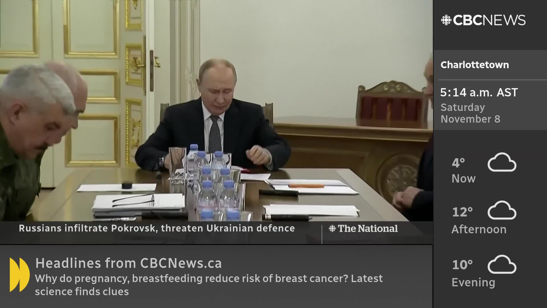 In a room with ornate trim, Vladimir Putin sits at a table, gesturing with his hands.  CBC News Network is reporting on the situation in Ukraine, as indicated by the lower-third text.
