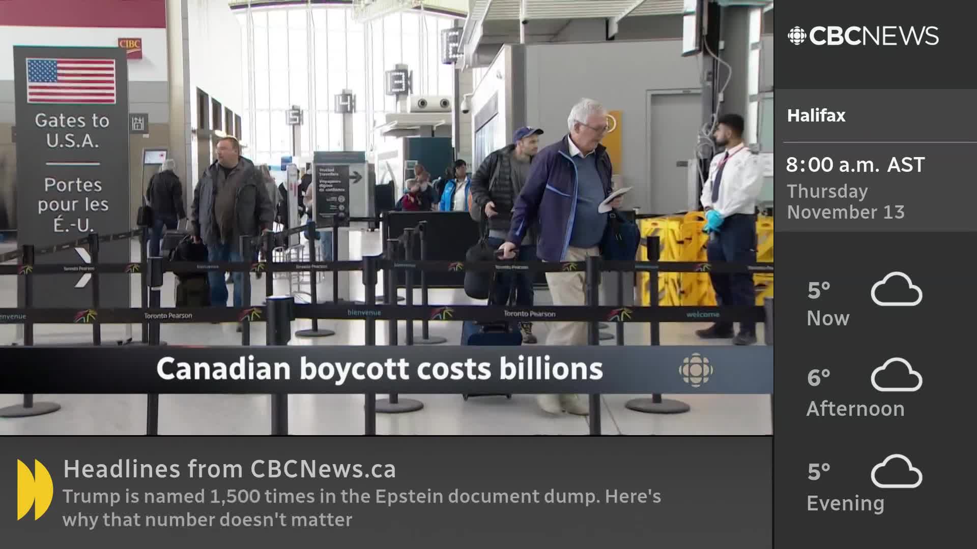 People are lined up at a security checkpoint, some with luggage, heading towards the U.S.A. A CBC News graphic at the bottom of the screen highlights a story about a Canadian boycott.
People are lined up at a security checkpoint, some with luggage, heading towards the U.S.A. A CBC News graphic at the bottom of the screen highlights a story about a Canadian boycott.