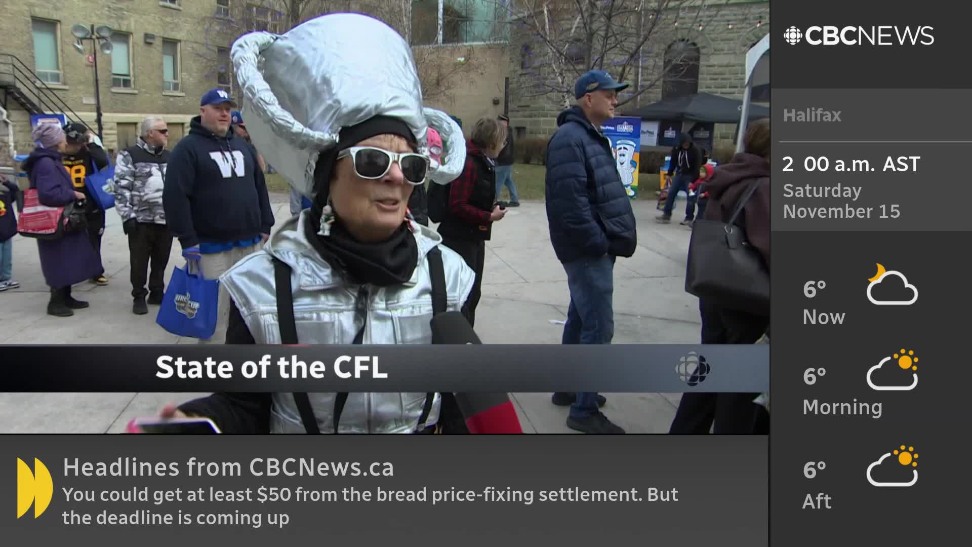 A person wearing a large, silver hat and sunglasses is being interviewed by a CBC News Network reporter. The reporter is holding a microphone, and the person is speaking into it, with a crowd of people milling around in the background.
A person wearing a large, silver hat and sunglasses is being interviewed by a CBC News Network reporter. The reporter is holding a microphone, and the person is speaking into it, with a crowd of people milling around in the background.