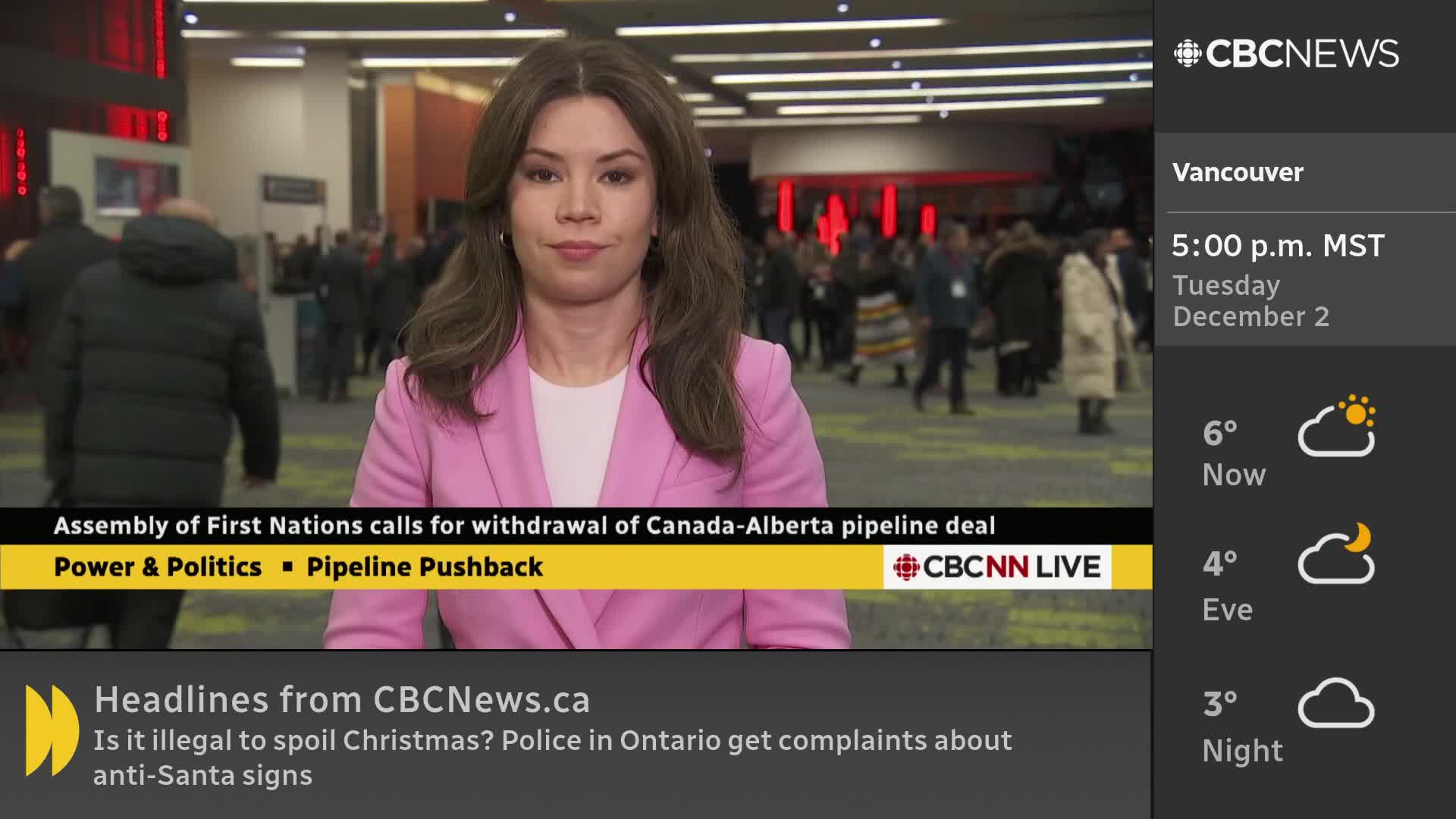 A CBC News Network anchor in a pink jacket stands in front of a busy background, reporting on a pipeline deal. Behind her, people mill about, some wearing coats, while the Vancouver weather forecast appears on the right.
A CBC News Network anchor in a pink jacket stands in front of a busy background, reporting on a pipeline deal. Behind her, people mill about, some wearing coats, while the Vancouver weather forecast appears on the right.