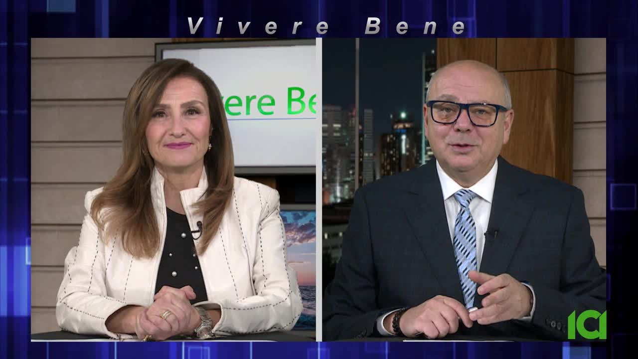 Two people are on screen, each in their own frame, likely on CFHD-DT in Canada. The woman on the left smiles, while the man on the right gestures with his hands as he speaks.
