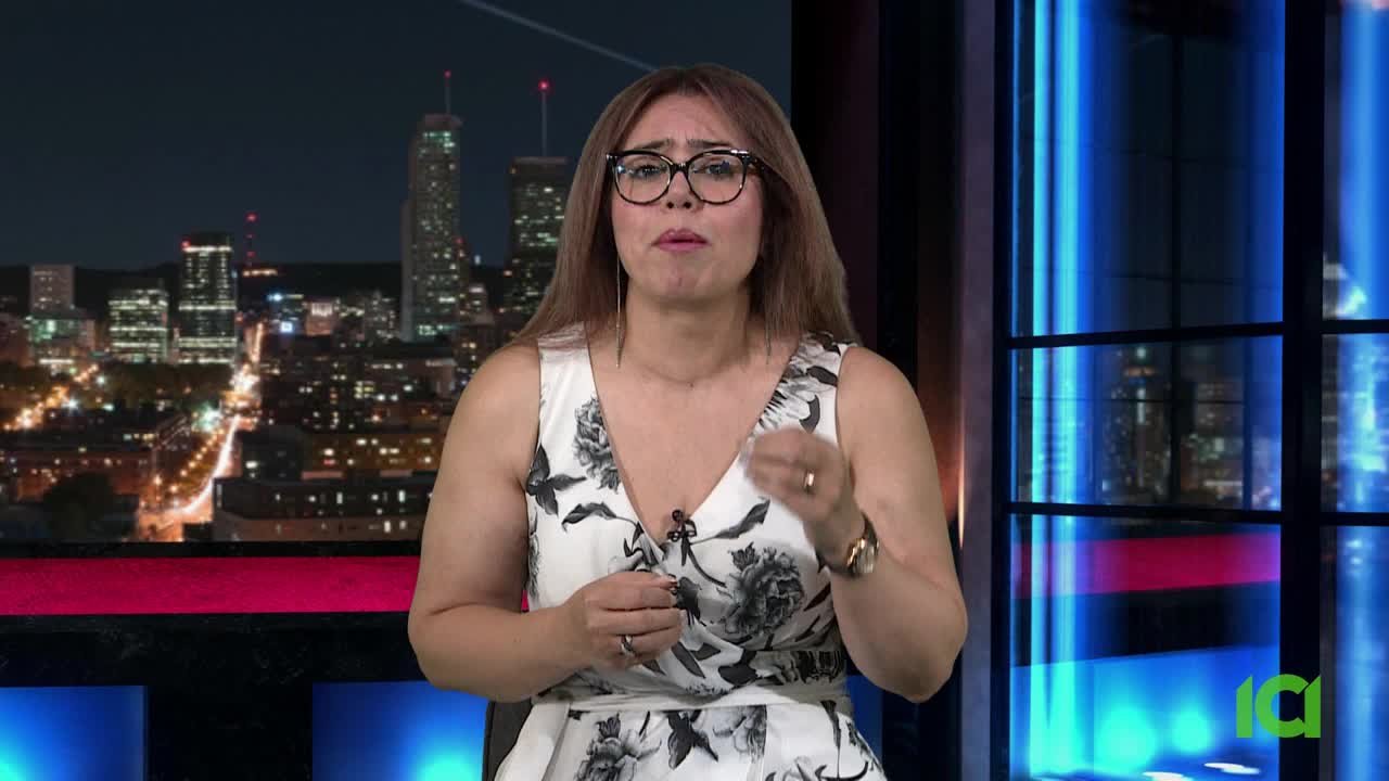 A woman in a floral dress gestures with her hands as she speaks. Behind her, a nighttime cityscape is visible, and the logo of CFHD-DT is in the corner.
