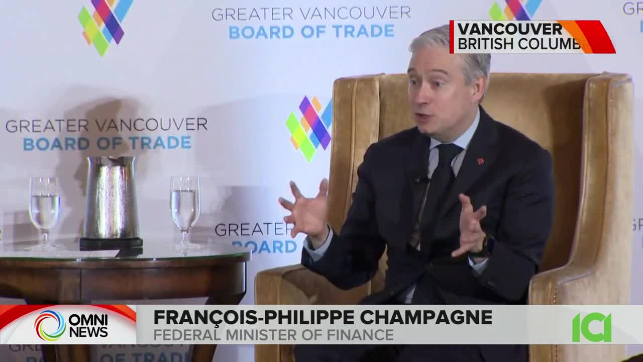 François-Philippe Champagne, the Federal Minister of Finance, is seated and gesturing with his hands. He's speaking at an event hosted by the Greater Vancouver Board of Trade, as seen on CFHD-DT.
François-Philippe Champagne, the Federal Minister of Finance, is seated and gesturing with his hands. He's speaking at an event hosted by the Greater Vancouver Board of Trade, as seen on CFHD-DT.