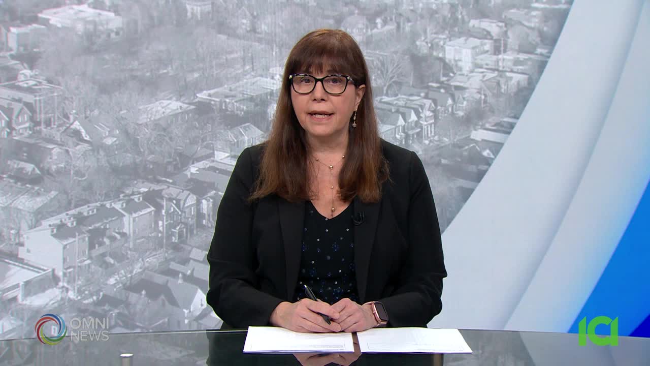 A woman in a black blazer speaks directly to the camera, her hands resting on papers before her. The Omni News logo appears in the lower left corner.