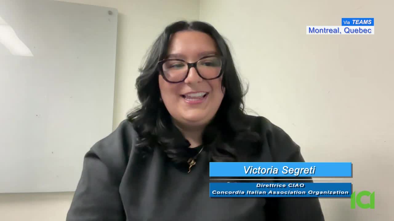 A woman with dark hair and glasses smiles directly at me. Her name, Victoria Segreti, and her title appear on a blue graphic overlay. The broadcast originates from Montreal, Quebec.