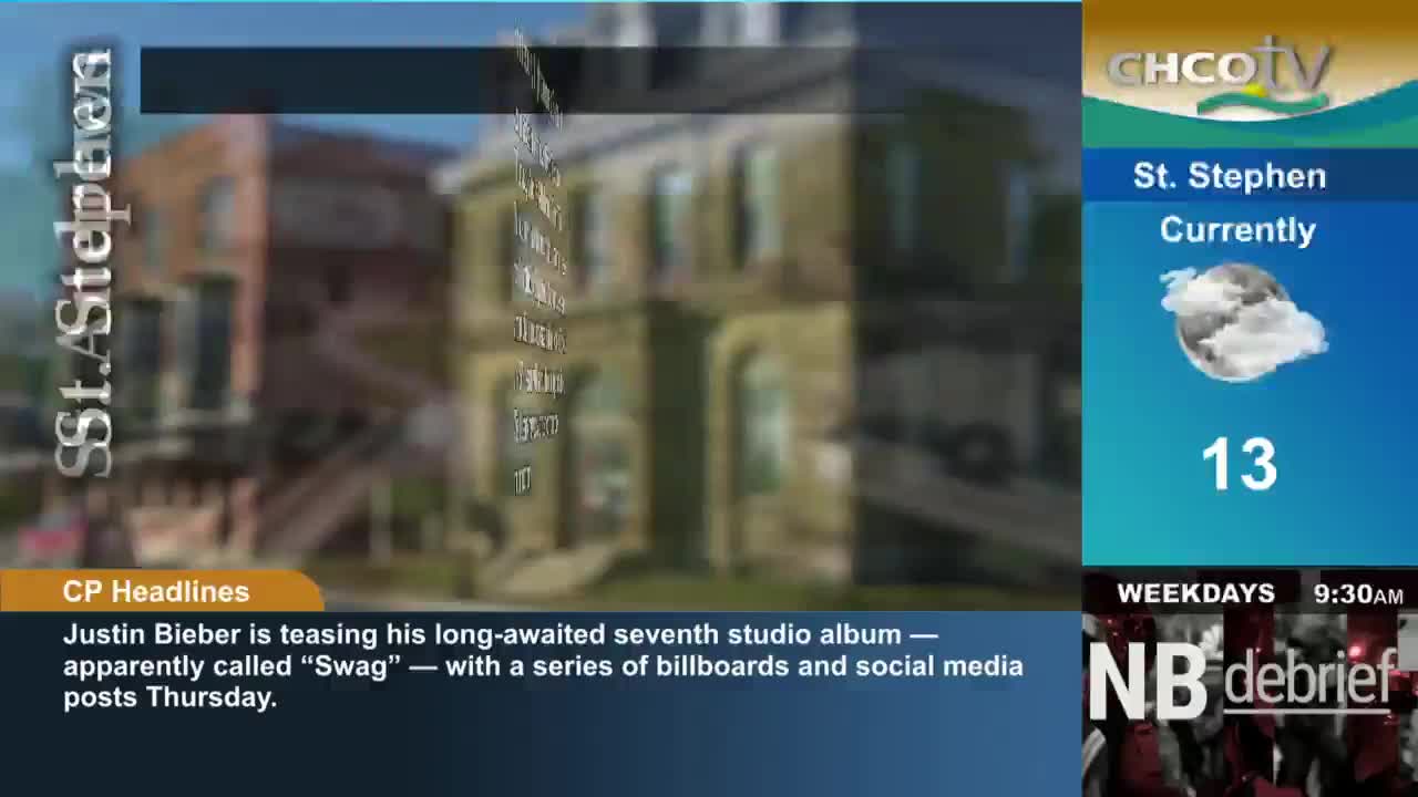 The CHCO-TV weather report for St. Stephen shows a cloudy sky and a temperature of 13 degrees. Below, a news ticker mentions Justin Bieber and his new album, "Swag."
