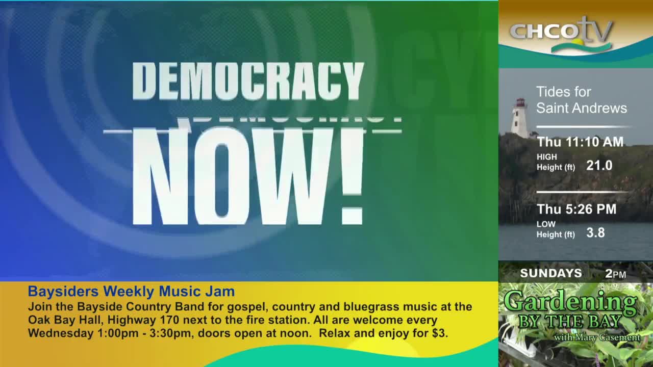 "DEMOCRACY NOW!" is in big, bold letters, with the CHCO-TV logo in the corner. The screen also shows a lighthouse and tide information for Saint Andrews.
