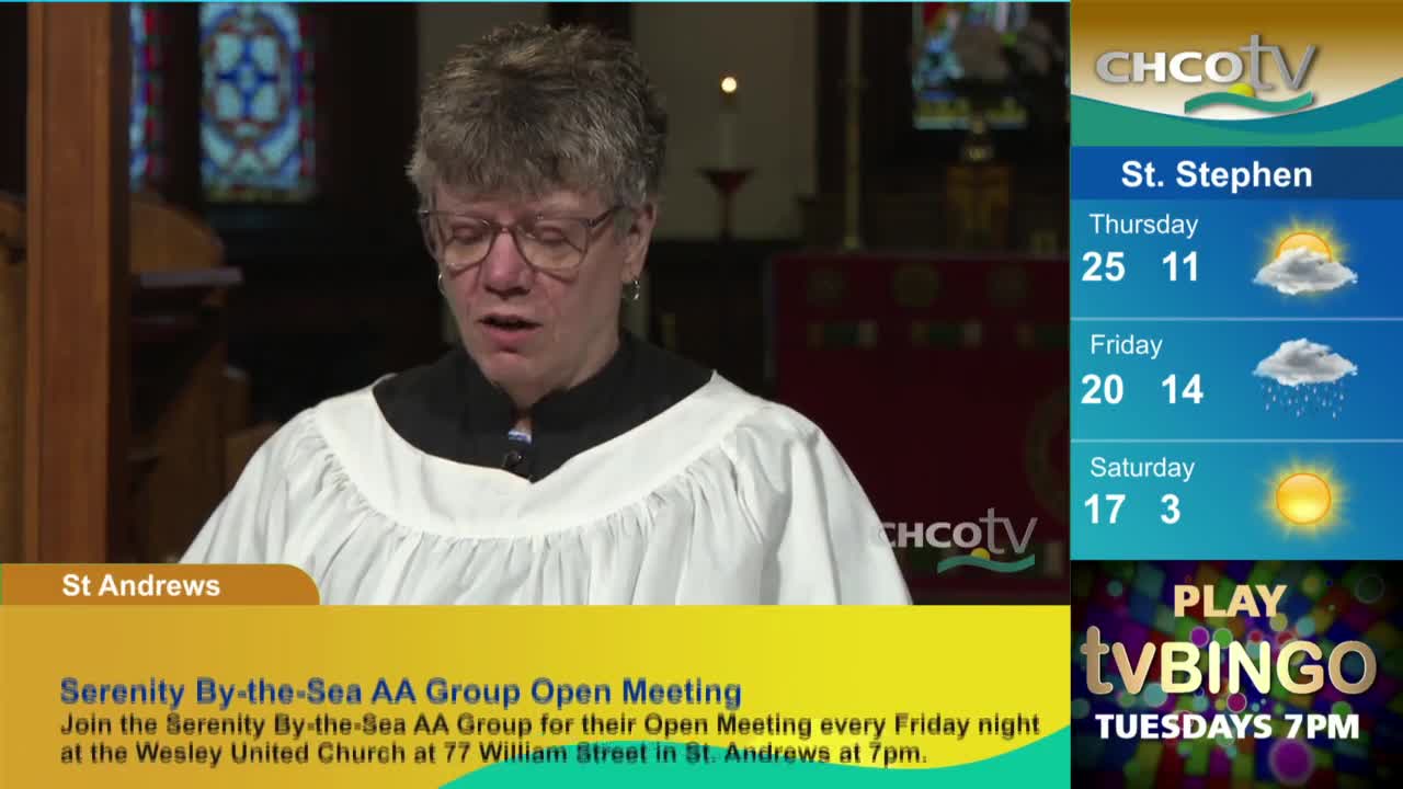 A woman in a white robe and glasses speaks, likely from a church, as CHCO-TV's weather forecast for St. Stephen, Canada, displays on the screen. Below, a yellow banner advertises an AA meeting in St. Andrews.
