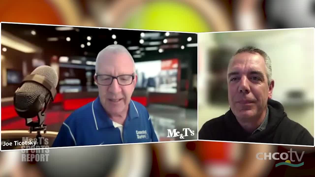 Joe Ticotsky, from Mc&T's Sports Report, is speaking into a microphone. On the right, another man is visible on a CHCO-TV screen.
