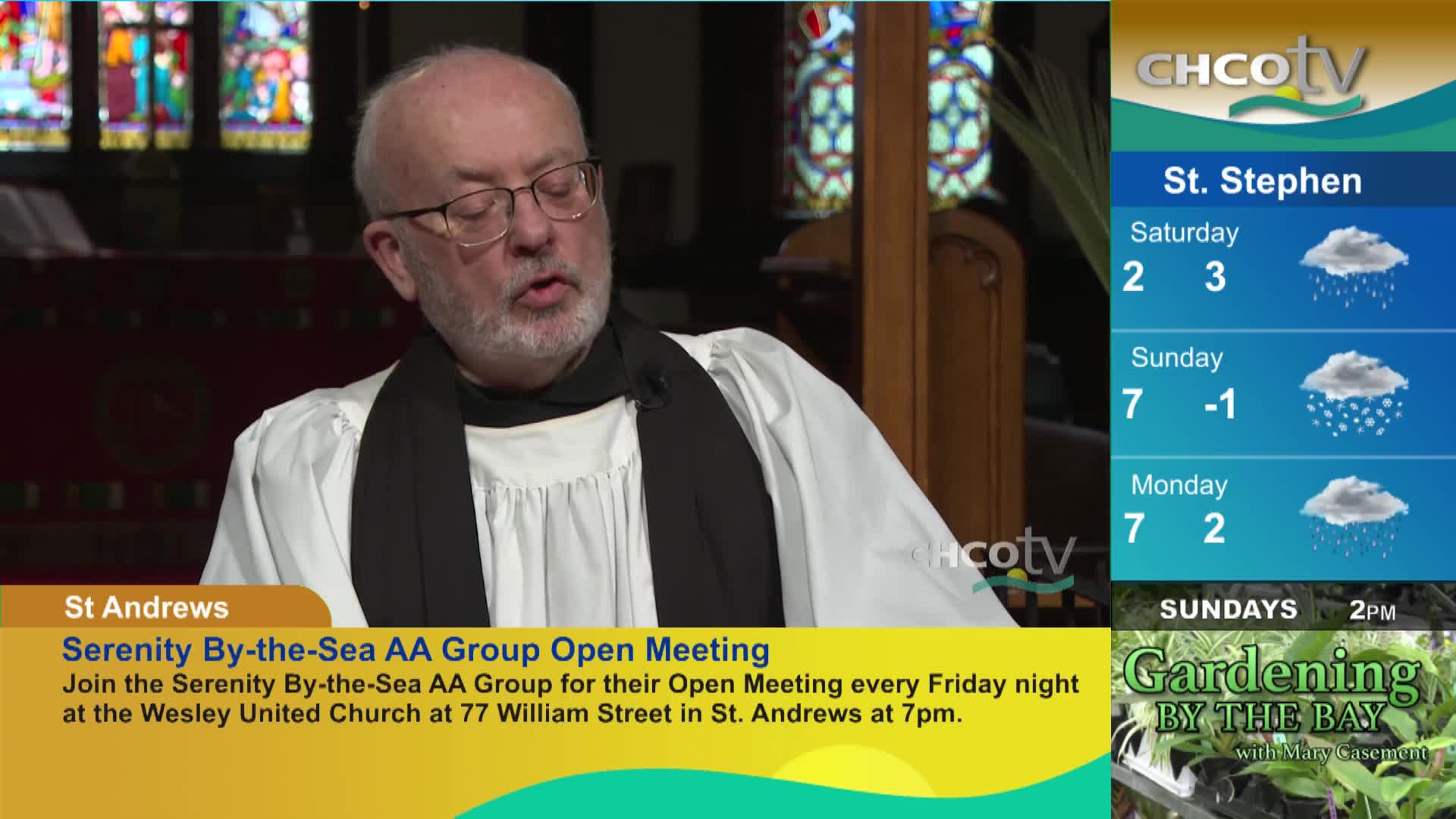 A man in a clerical collar speaks, framed by stained glass windows. A weather report for St. Stephen shows rain and snow, and an announcement for a meeting in St. Andrews scrolls by. A man in a clerical collar speaks, framed by stained glass windows. A weather report for St. Stephen shows rain and snow, and an announcement for a meeting in St. Andrews scrolls by.