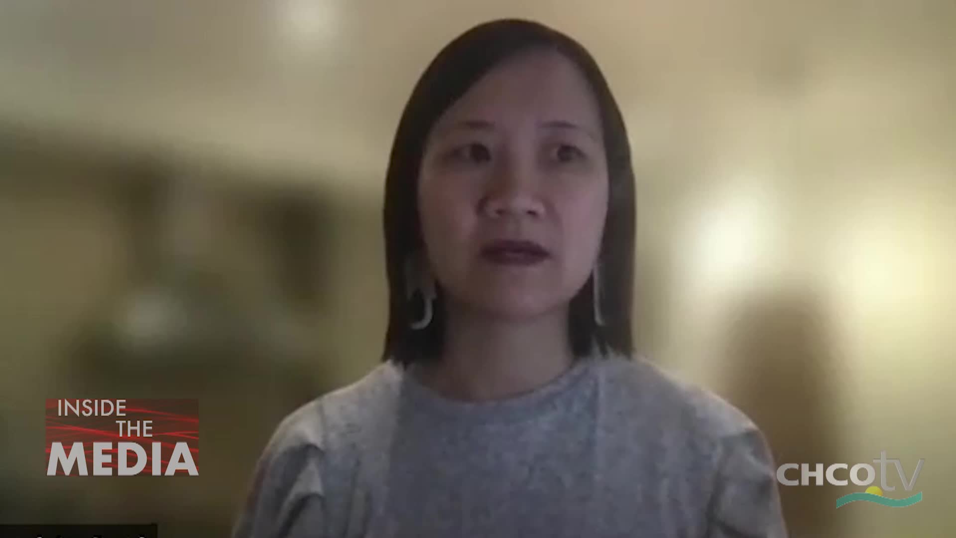 A woman with dark hair and long earrings speaks, her face illuminated by soft light. The "Inside the Media" logo appears in the lower left corner, and the CHCO-TV logo is visible on the right.
