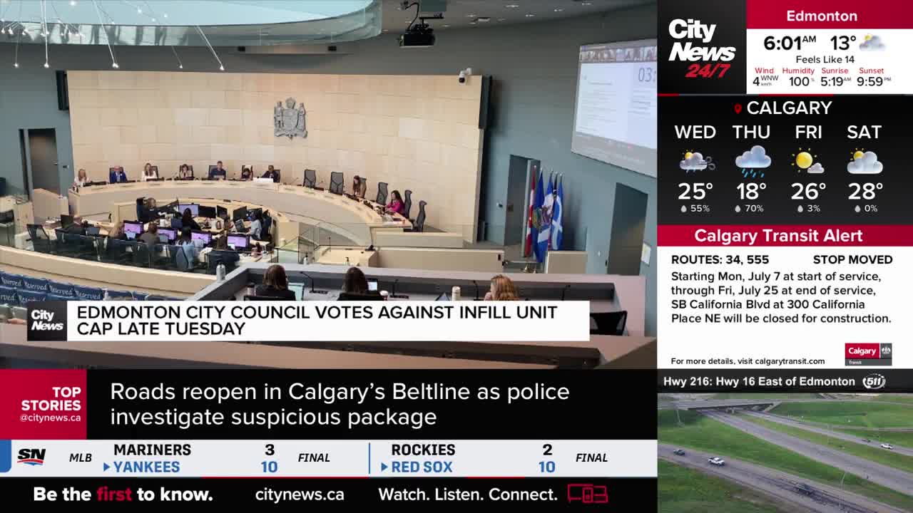 A CityNews graphic flashes across the screen, reporting on the Edmonton City Council. In the background, council members sit at a large, curved table, facing the camera.

