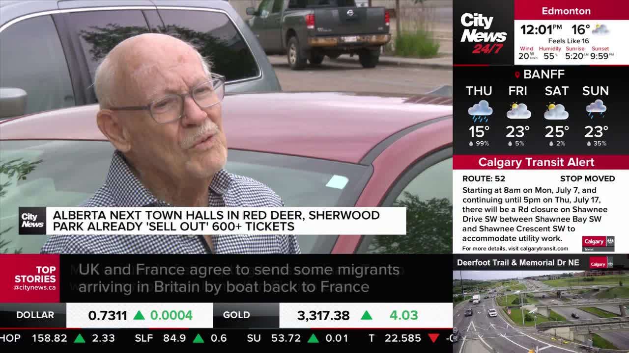 A man with glasses speaks, his face framed by a red car. CityNews Calgary's screen displays information about Alberta town halls and a transit alert for Route 52.
